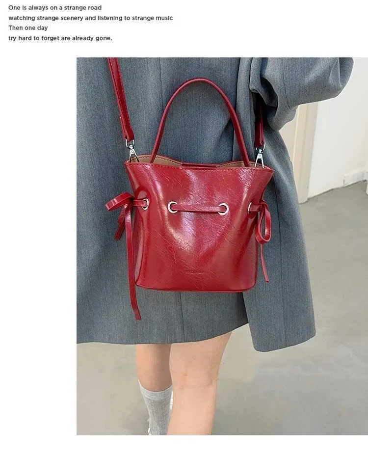 Borsa a secchiello vintage in ecopelle con fiocco borsa a tracolla_voghion.com