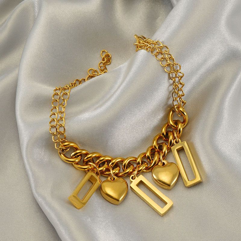 Braccialetto alla moda in acciaio inossidabile con combinazione di titanio, dorato, geometrico, design di nicchia per le donne_voghion.com