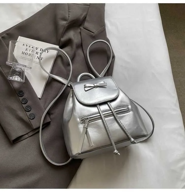 Mochila feminina sólida com aba e laços, mini bolsas de ombro, versátil, feminina, grande capacidade, bolsas de couro, casual, estudante_voghion.com
