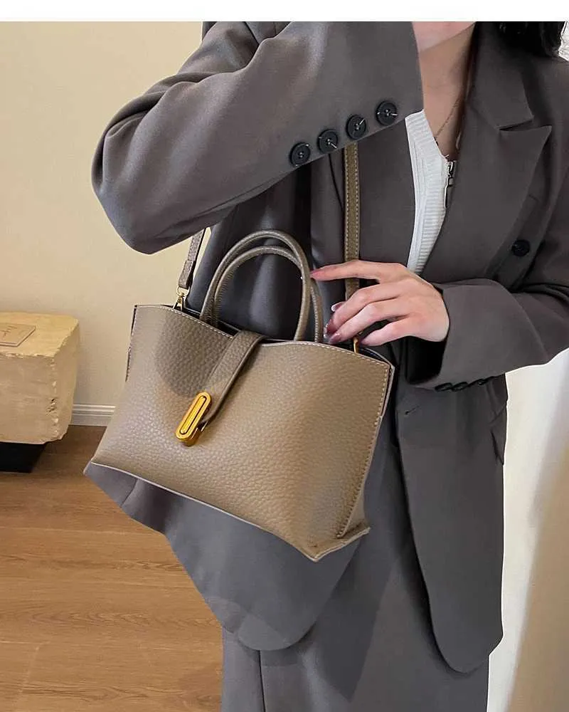 Clássico Preto PU Grande Capacidade 2024 Feminino Alta Qualidade Requintado Fivela de Fecho Bolsas Crossbody Casual Versátil_voghion.com
