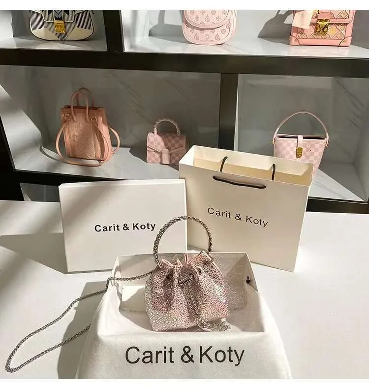 Borsa a tracolla con manico ad anello in metallo con glitter lucido Dias da sera, da donna, da festa, da sposa_voghion.com