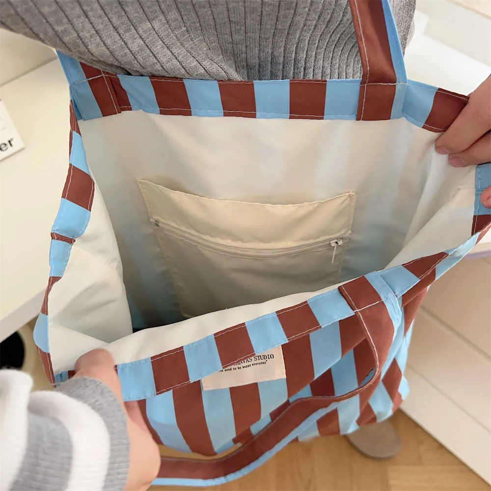 Vintage gestreifte warme Leinwand große Kapazität tägliche Einkaufstasche lässig tragbare Damen Reisehandtasche Y241109_voghion.com