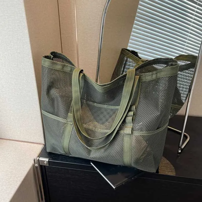 Hollow large capacity makeup storage womens multifunctional mesh shoulder travel transparent beach bag Y241011_voghion.com