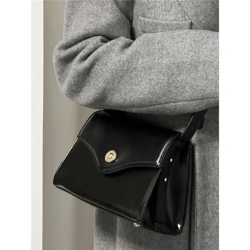 Black PU Leather Single Shoulder 2023 New Womens Buckle High Capacity Underarm Bag Designer Advanced Texture Ladies_voghion.com