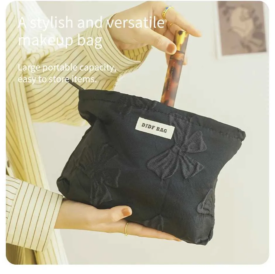 Pochette trucco nera con fiocco grande beauty case elegante_voghion.com