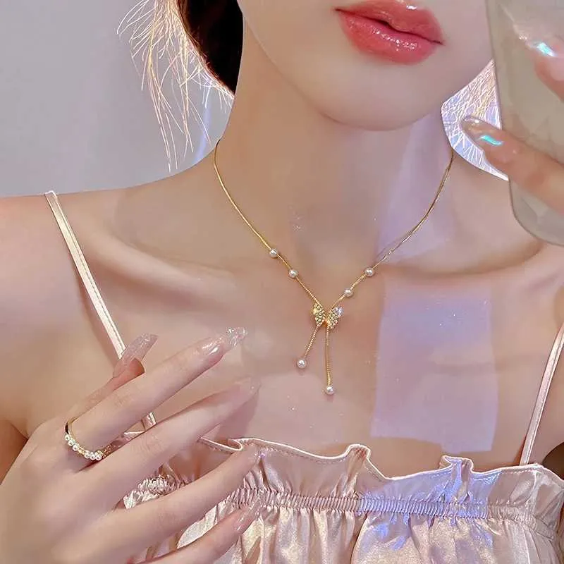 Colliers pendentifs rétro papillon doré en acier inoxydable avec chaîne serpent et breloque tendance pour femmes_voghion.com