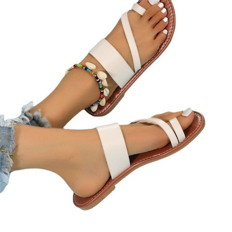 Infradito da donna con punta oversize e fondo piatto, con tacco piatto e sandali da spiaggia sulla parte esterna dello slip_voghion.com