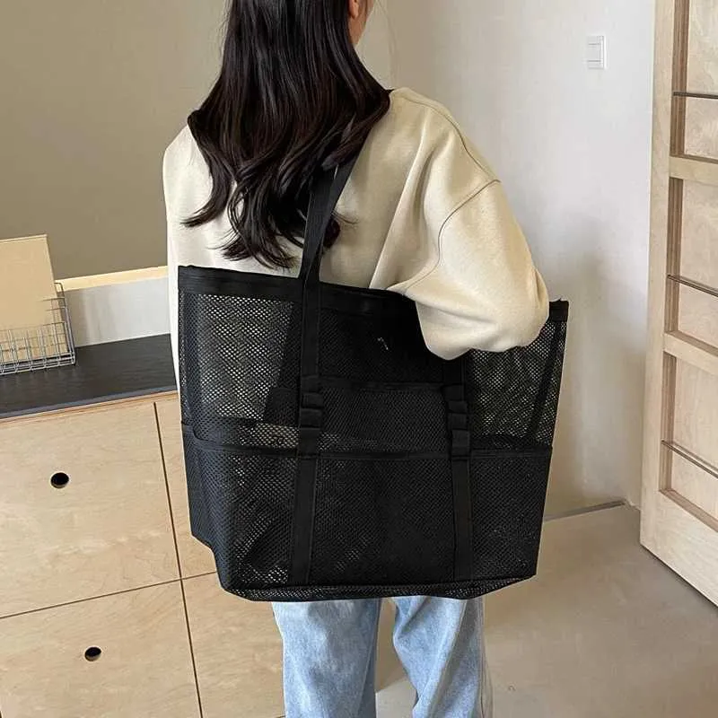 Hollow large capacity makeup storage womens multifunctional mesh shoulder travel transparent beach bag Y241011_voghion.com