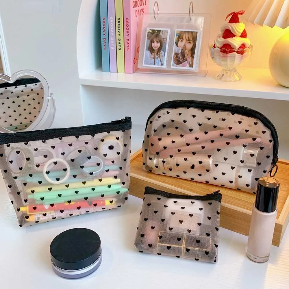 Trousse de maquillage noire en maille transparente en forme de cœur, indispensable pour les organisateurs de voyage pour femmes, petite trousse de maquillage Y241023_voghion.com