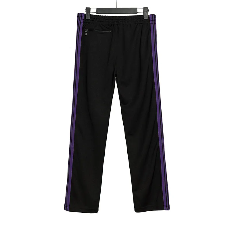 Mäns Needles-spår Fritidsbyxor Streetwear AWGE Träningsbyxor Kvinnor Herr Randig Dragkedja Byxa Butterfly Broderi Joggers Needles_voghion.com
