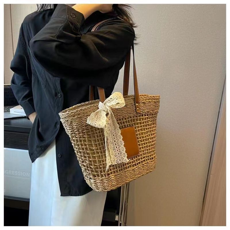hollow shoulder new simple straw woven holiday style beach versatile women's bag_voghion.com