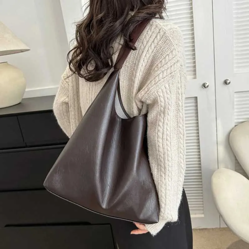 Design classico, alla moda, senso coreano e grande capacità, morbida pelle, tracolla da pendolare sotto le ascelle per ufficio_voghion.com