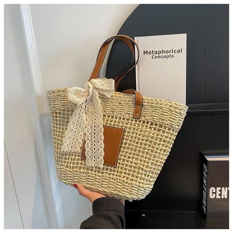 hollow shoulder new simple straw woven holiday style beach versatile women's bag_voghion.com