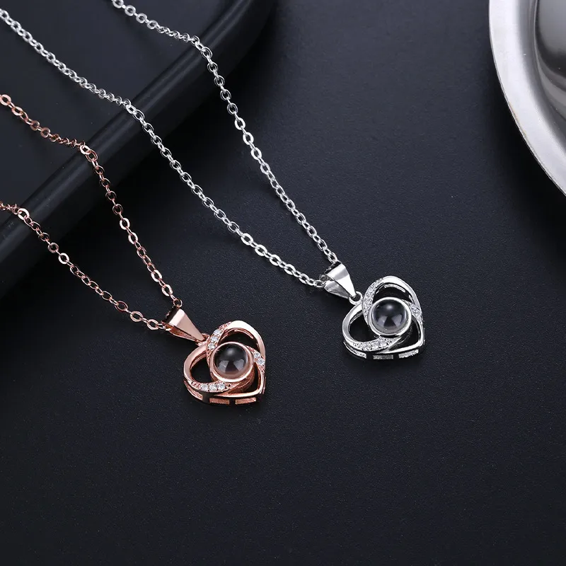 Collane con ciondolo Collana con proiezione con rosa rotante Regalo 100 lingue Ti amo Cuore Gioielli per donne Natale_voghion.com