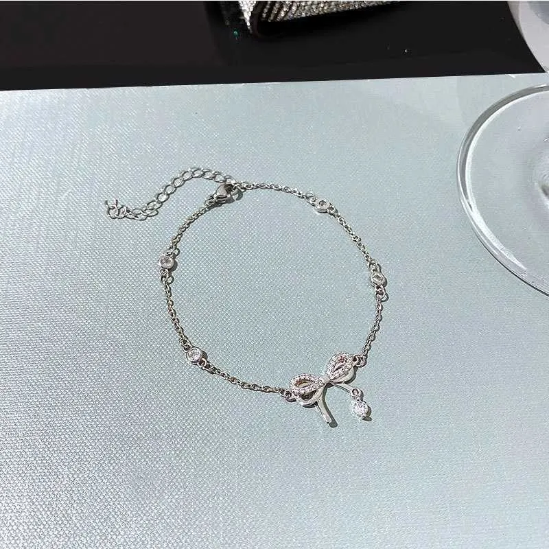 Bracciale regolabile con fiocco in strass per donna gioiello_voghion.com