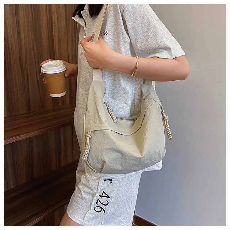 Version coréenne à la mode et minimaliste dumpg populaire cette année, nouveau sac à bandoulière de haute qualité, fourre-tout de grande capacité_voghion.com