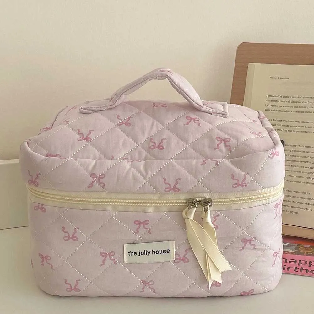 2024 Rosa Schleife Stepptasche Tragbarer Reißverschluss Make-Up Reiseveranstalter Damen Handtasche Y241023_voghion.com