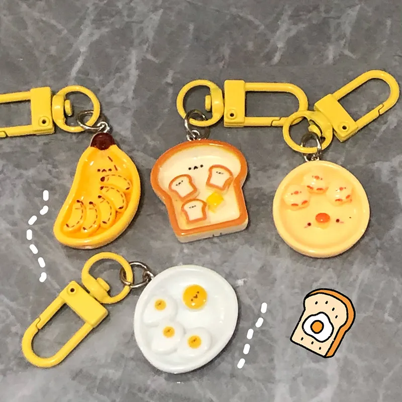 Portachiavi con simpatico cartone animato, uovo in camicia, banana e toast, creativo, per la colazione, decorazione per zaino, borse, ciondolo_voghion.com