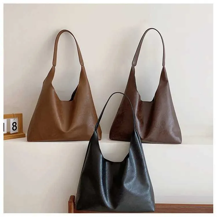 Lightweight PU soft leather large capacity womens shoulder lower arm buckle casual style makeup bag Y241123_voghion.com