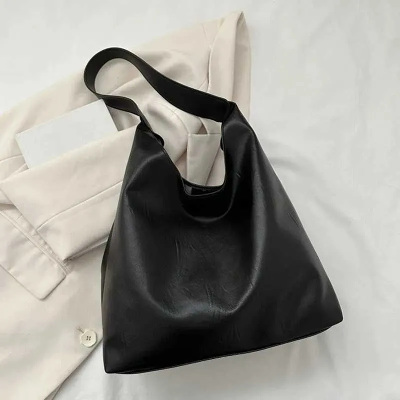 Vintage schoudertas en tote bag van kunstleer voor dames_voghion.com