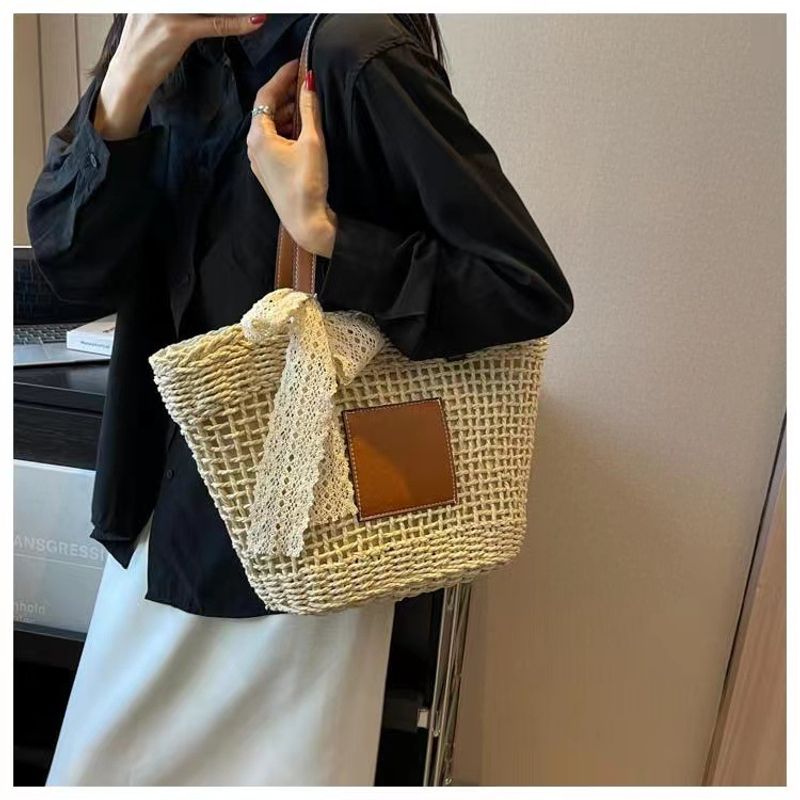 hollow shoulder new simple straw woven holiday style beach versatile women's bag_voghion.com