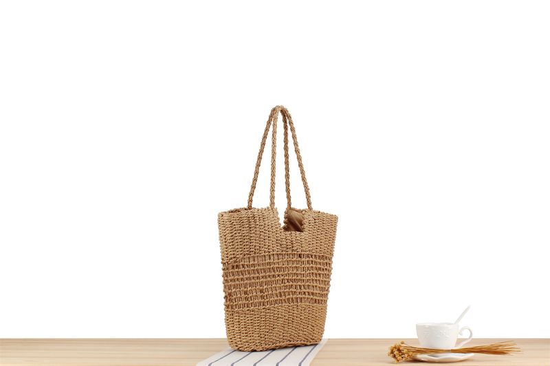 Gewebte Tasche aus Papierseil, neue französische Nischen-Hohlgewebetasche, eine Schulter, handgehaltene Strandtasche mit_voghion.com