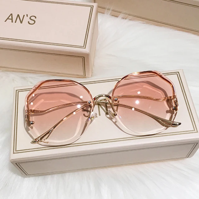 Fashion 2024 Round Gradient Sunglasses Women Metal Curved Temples Eyewear Ocean Rimless Fashion Sun Glasses Ladies UV400_voghion.com