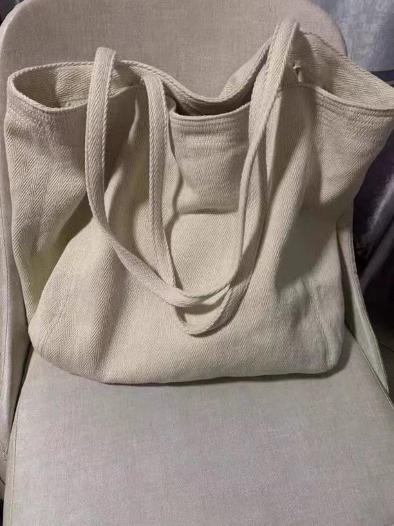 2024 New Handheld Single Simple Commuting Canvas Women's Twill Tote Casual Korean Edition Large Capacity Shoulder Bag_voghion.com
