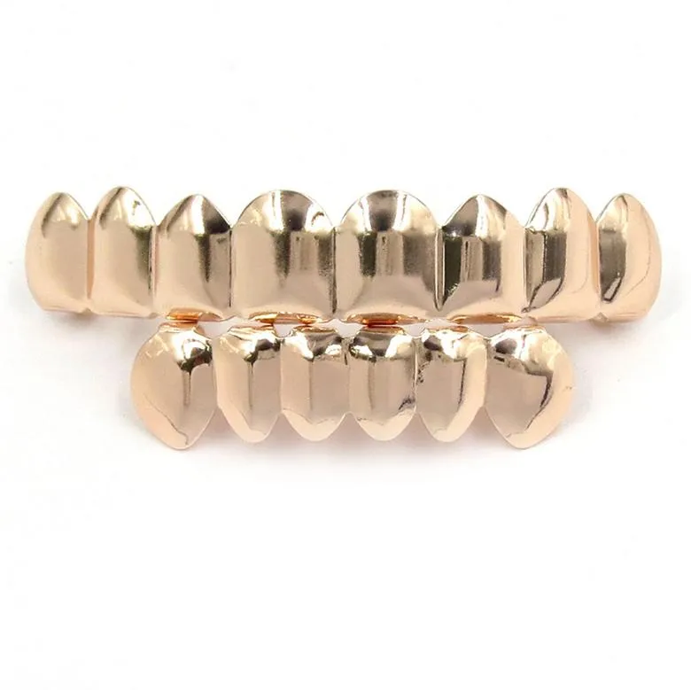 Hip Hop Grillz 2023 Nuova moda ambientale placcato oro griglie dentali all'ingrosso Halloween denti bretelle set da 2 pezzi_voghion.com
