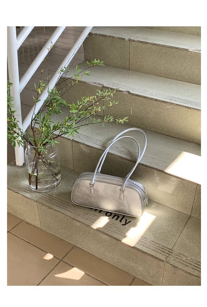 2024 Estate coreana Nuovo design di nicchia Borsa da donna portatile in stile balletto Tendenza moda Borsa versatile in argento con tracolla singola_voghion.com
