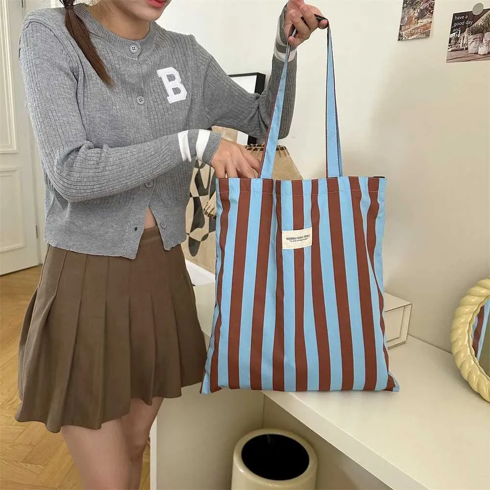 Vintage gestreifte warme Leinwand große Kapazität tägliche Einkaufstasche lässig tragbare Damen Reisehandtasche Y241109_voghion.com