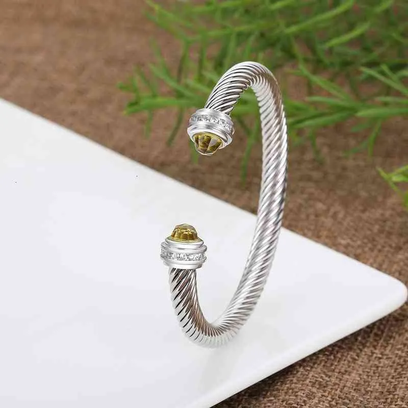 Flätat öppet armband för kvinnor och män design smycken mode_voghion.com