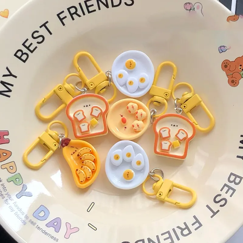 Portachiavi con simpatico cartone animato, uovo in camicia, banana e toast, creativo, per la colazione, decorazione per zaino, borse, ciondolo_voghion.com