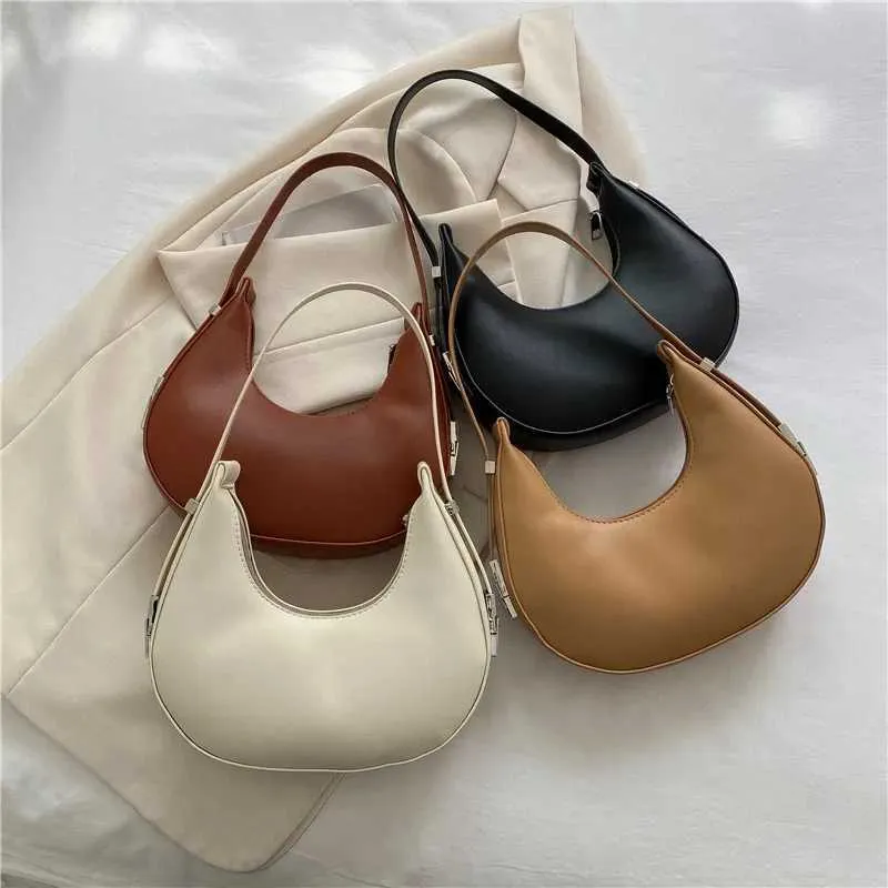 Borsa a spalla a mezzaluna donna elegante in ecopelle_voghion.com