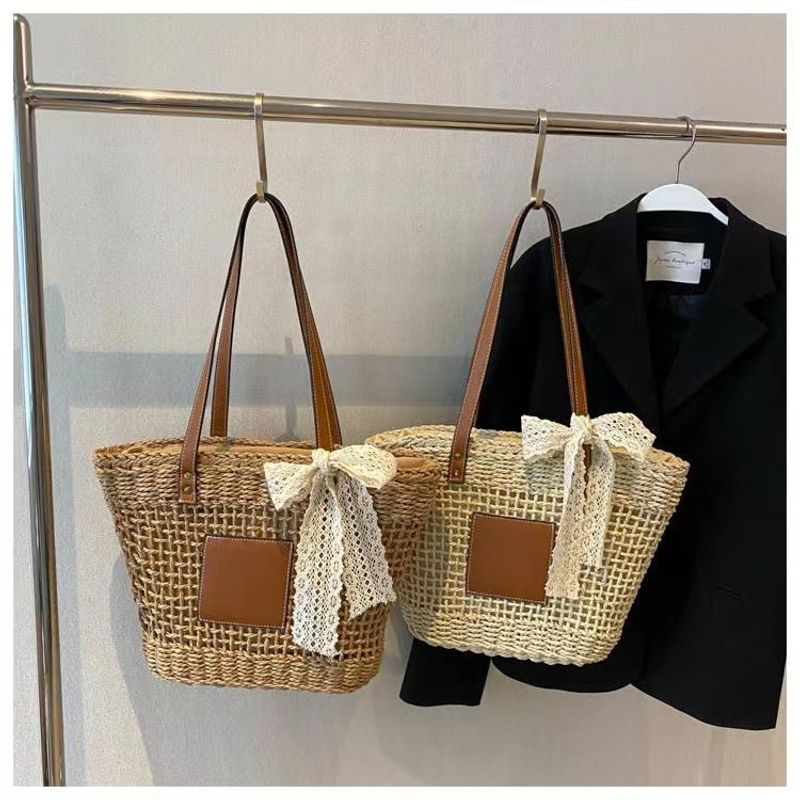 hollow shoulder new simple straw woven holiday style beach versatile women's bag_voghion.com