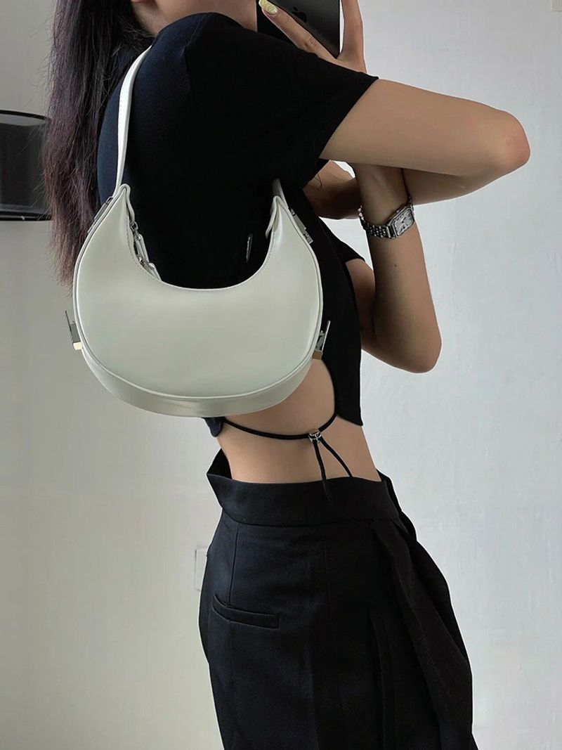 Eine Nischendesign-Schulter mit Halbmond für Frauen im Jahr 2024, neue personalisierte und minimalistische Tasche,_voghion.com