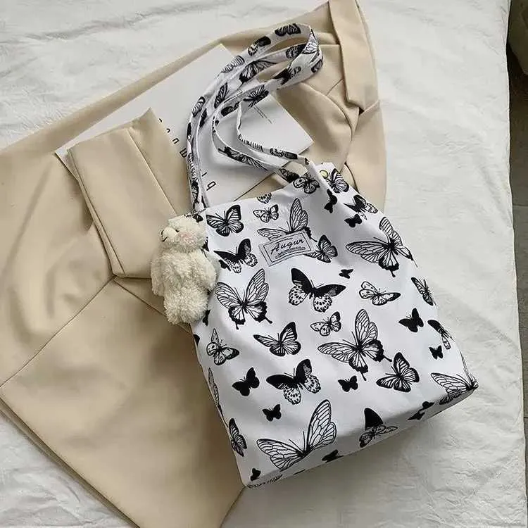 Sac à main en toile imprimé léopard pour femme, mode coréenne décontractée, nouveau sac de shopping, sac à main imprimé pour étudiant, Bolsa Mujer Y241026_voghion.com