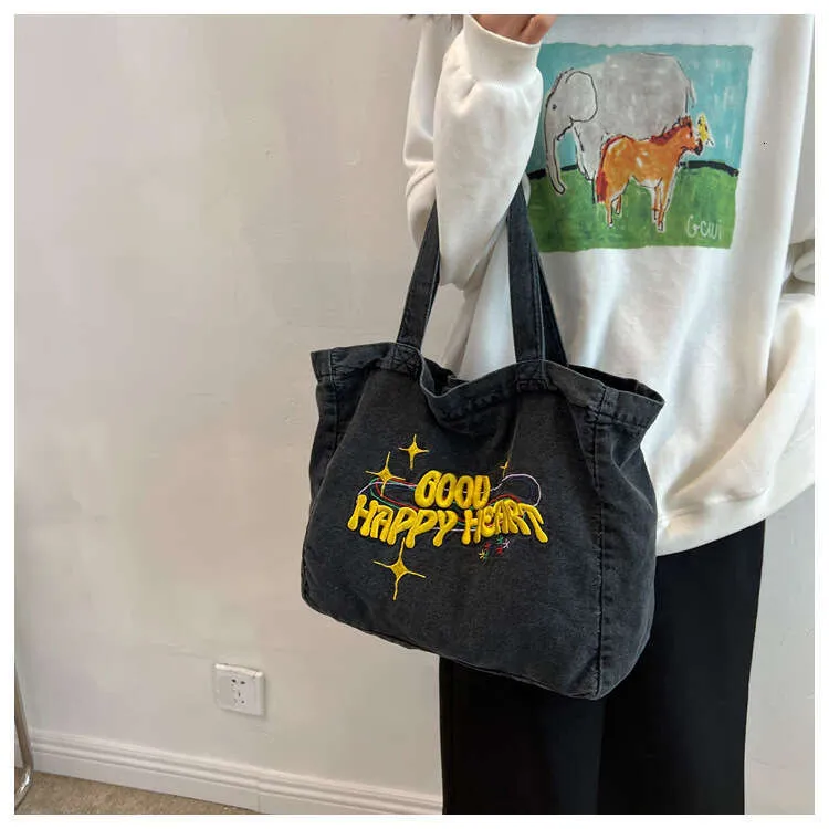 New Large Capacity Cowboy Shoulder Student's Canvas Schoolbag Women's Shopping Bag Street Dressing_voghion.com