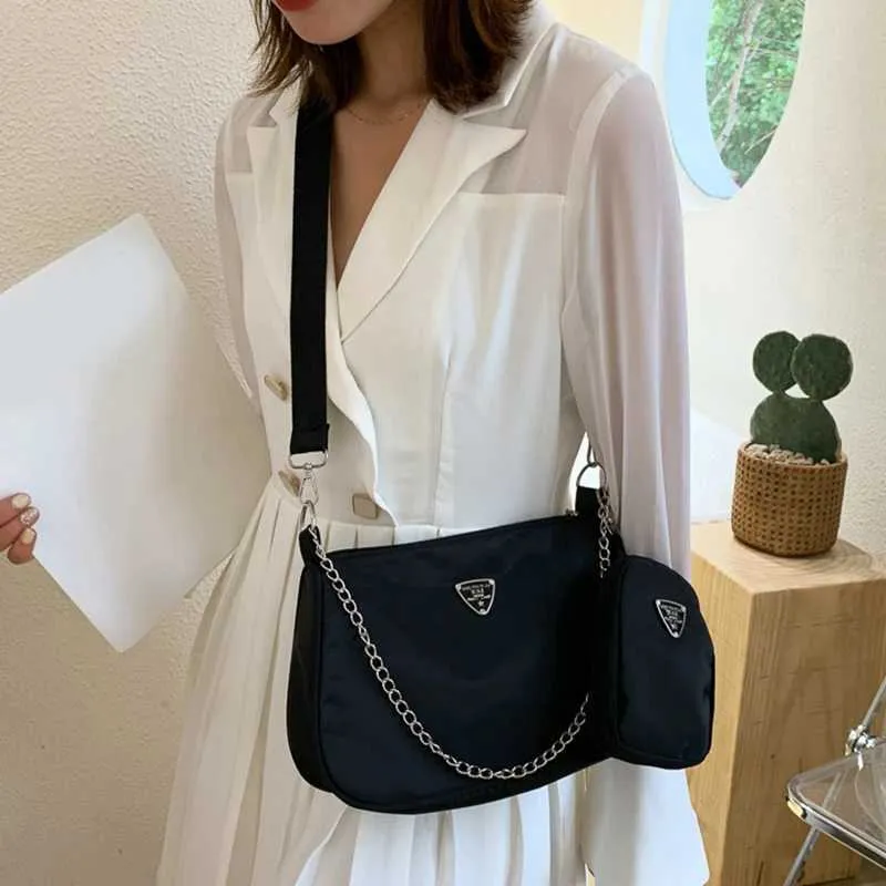 Borsa a mano elegante da donna con stampa pitone e tracolla_voghion.com