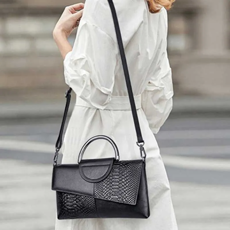 Borsa a mano elegante da donna con stampa pitone e tracolla_voghion.com