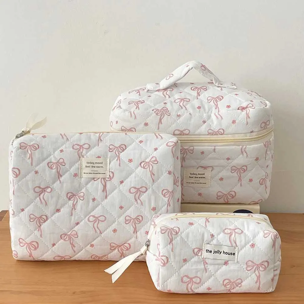 Neue Mode Bogen Frauen Gesteppte Make-Up Tragbare Kosmetik Wc Lagerung Handtasche wer Baumwolle Reißverschluss Tasche Y241023_voghion.com