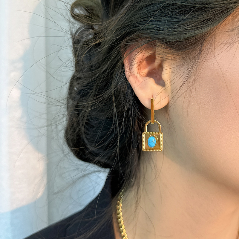 Gute, nuovo design alla moda, collana con lucchetto turchese blu, bracciale in acciaio al titanio, set di quattro gioielli resistenti alla luce_voghion.com