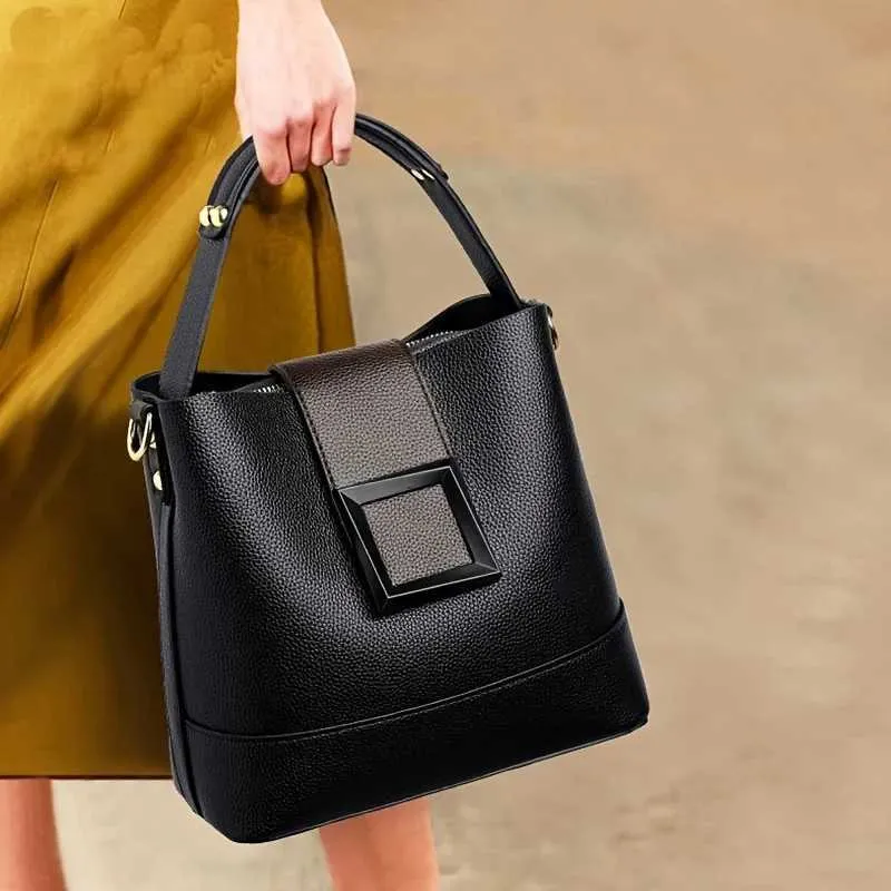 Borsa a secchiello in pelle da donna, elegante, con manico superiore, comoda tracolla, design alla moda, borsa a mano, tracolla_voghion.com