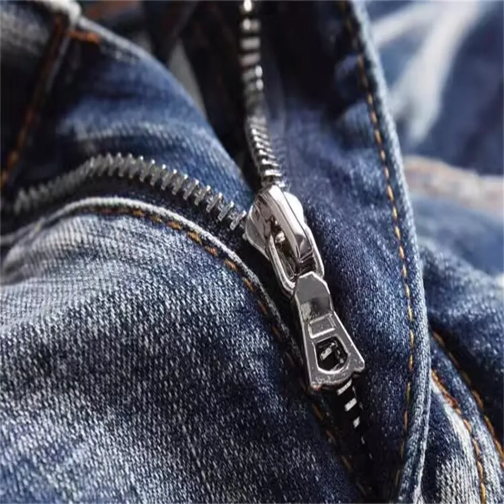 2025 New Free Shipping Designer Jeans Embroidered Men Jeans With Knee Hole Zipper Small Leg Large Denim Pants Durable_mkmklike.com