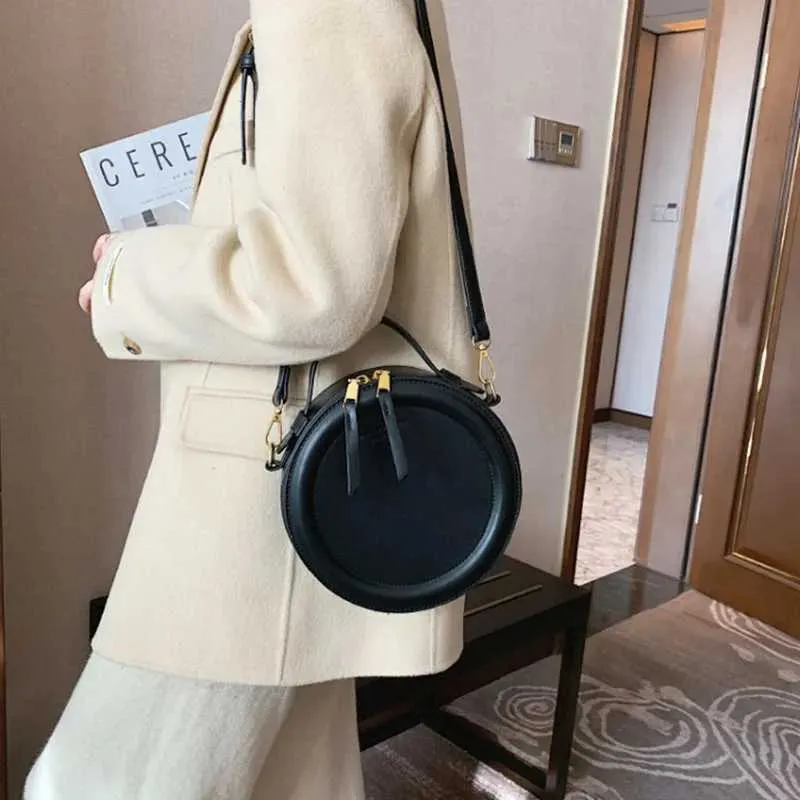 Sac à bandoulière de couleur unie pour petit sac à main rond pour femmes, sacs de créateurs de mode, sac à bandoulière en cuir, fermeture éclair pour femmes_voghion.com