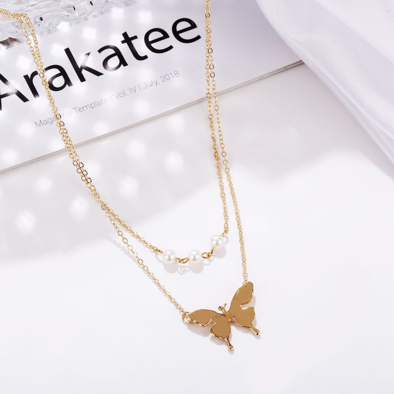 Collana con ciondolo a farfalla con doppia perla, catena per clavicola retrò creativa_voghion.com