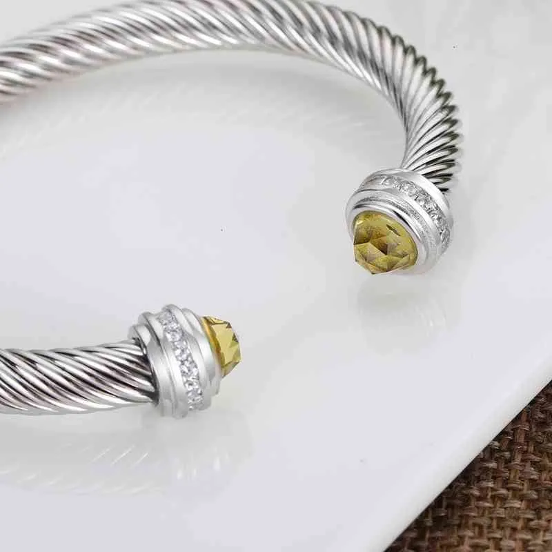 Flätat öppet armband för kvinnor och män design smycken mode_voghion.com