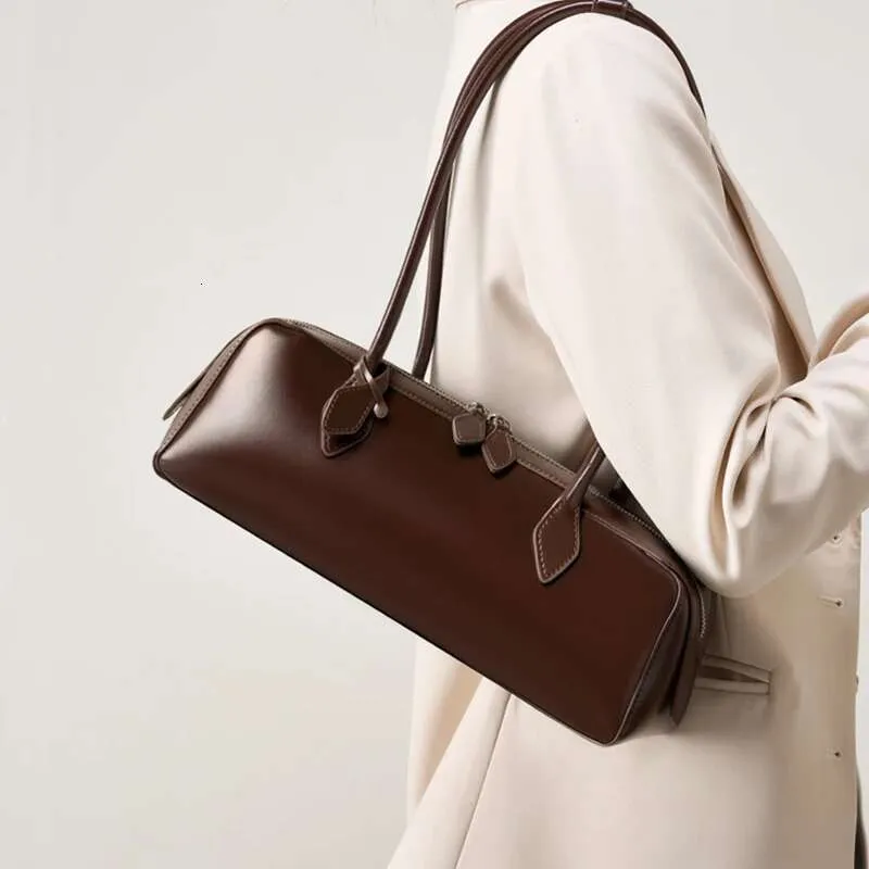 designer Bag 2025 Toptrends Cowhide Genuine Leather Underarm Shoulder Bags For WomenDesigner Long Handle Tote Bowg_voghion.com