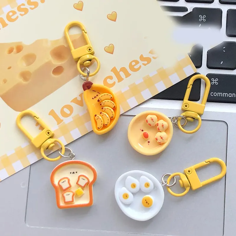 Portachiavi con simpatico cartone animato, uovo in camicia, banana e toast, creativo, per la colazione, decorazione per zaino, borse, ciondolo_voghion.com