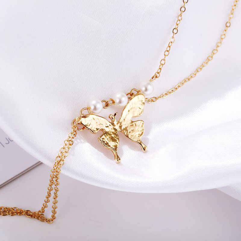 Collana con ciondolo a farfalla con doppia perla, catena per clavicola retrò creativa_voghion.com